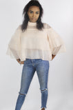 The 'ZARA' sheer layered frill blouse with high neck and layered frill wide sleeve. Available in black and nude.