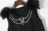 The 'FIFI' fint knit vest with faux fur shoulder pom poms and diamante and pearl neck embelishment